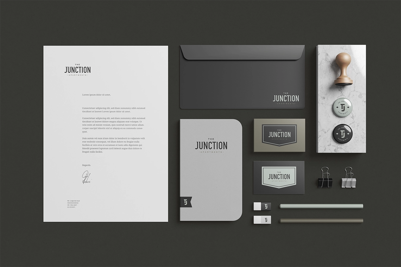 The Junction apartments mockup branding collateral