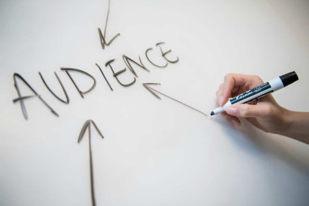'Audience' written on a whiteboard.