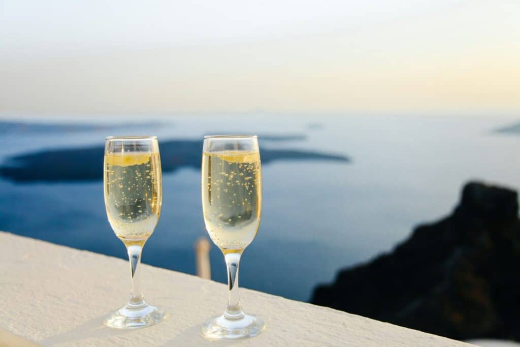 2 glasses of champagne and a scenic sea view.