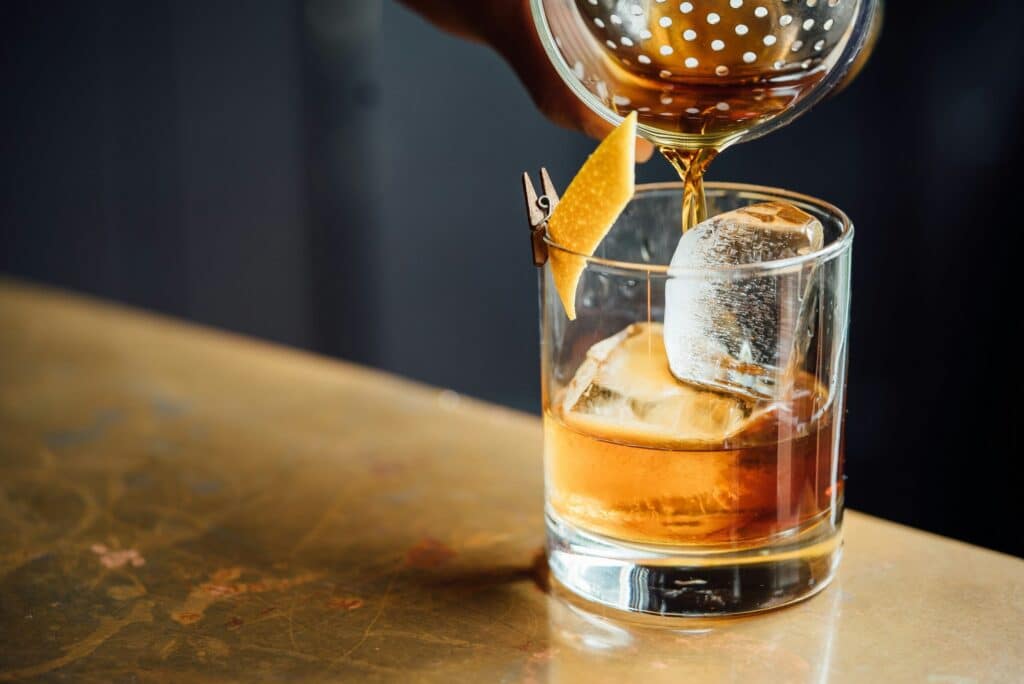 Luxury whiskey being poured.