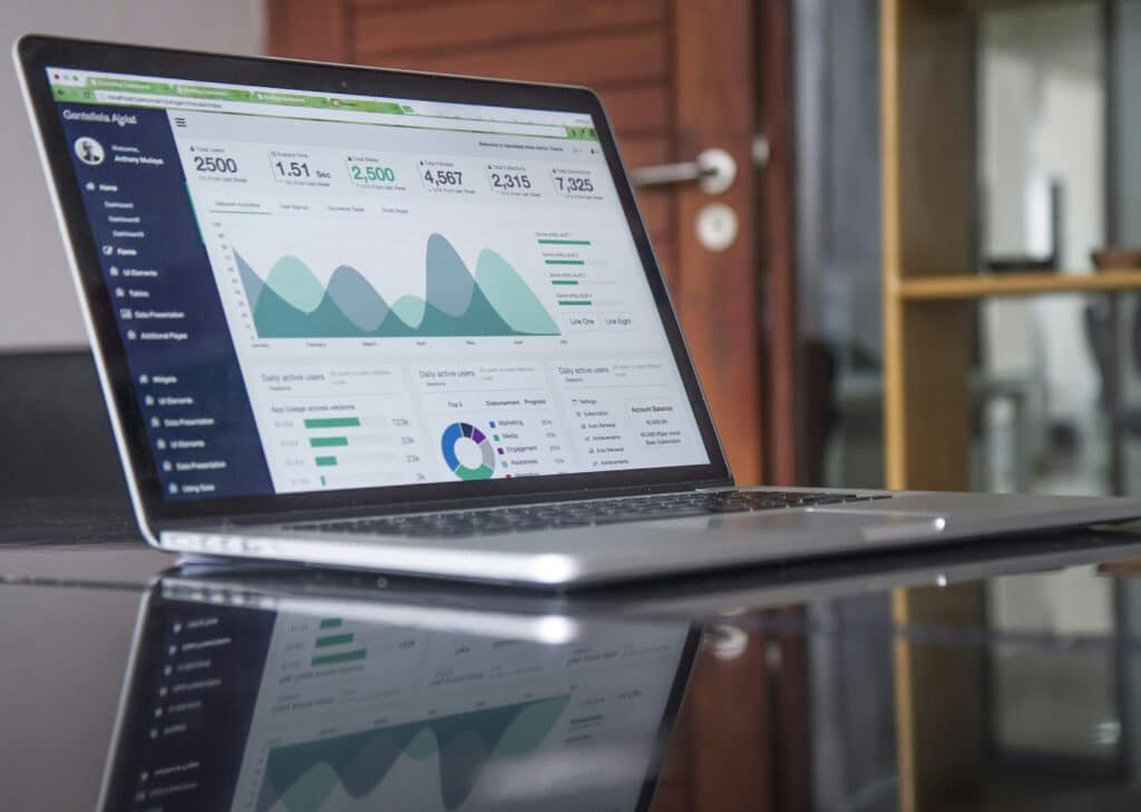 Mac computer showing digital marketing metrics.